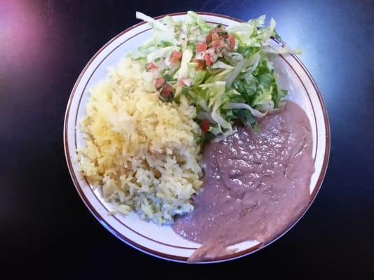 Side Condiments for Fajitas - 2 Stars - awful rice and plain as it gets re-fried beans cost the entree a star.