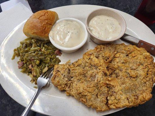 Chicken fried steak and white gravy on the side. Fantastic grilled green beans!