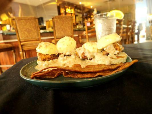 Yes, that's a poached egg, chicken, bisque and sausage gravy.