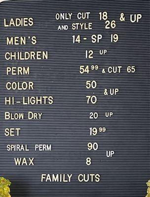 $14 for man's cut. $19 with a shampoo