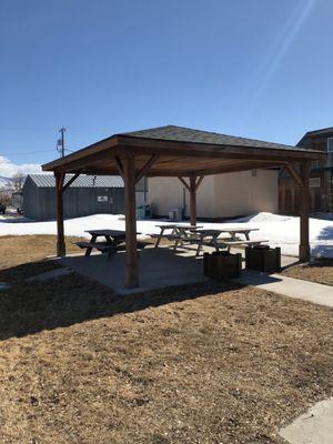 Picnic tables next to fire station