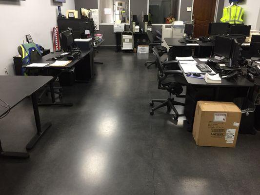 Unis polished concrete flooring stained black