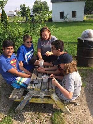 There is plenty of outdoor seating... Why these teenage children all sat at the smallest table is still a mystery to me.