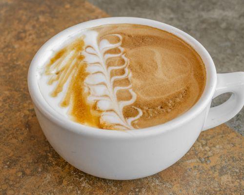 Indulge in creamy perfection with our Caramel Macchiato - a heavenly blend of espresso, velvety milk, and sweet caramel swirls.