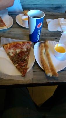 Delicious  $ 5.75 lunch special , meat lover's slice, pepperoni breadsticks with cheese sauce and a fountain drink. WoW !