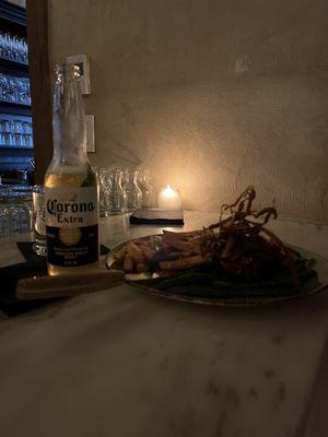 Filet Mignon topped with crispy parsnips. A Corona to complete this dish.