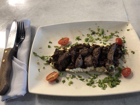 Tenderloin tips with goat cheese and caramelized onions