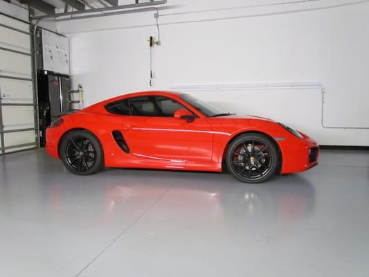 This Porsche Cayman has 3M Pro Series Paint Protection on the entire front end, 3M 1080C Black Matte on the spoiler, and tail light smoke.