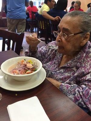 Abuelita enjoying a shrimp ceviche