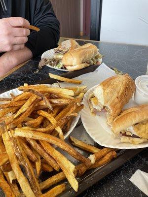 Ham stinger, plain (chicken ham and cheese like a chicken cordon bleu) and a steak and cheese with fries