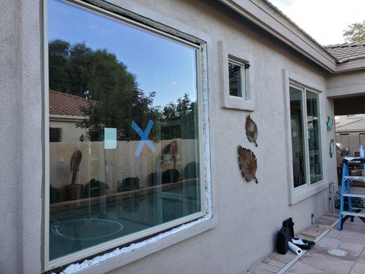 Econ Windows - The pool area in the Chandler home. Had the original single pane windows, changed to vinyl framed tempered lowe glass units.