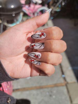 Halloween nails with spiders and spiderwebs