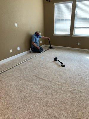 Dave fixing the carpet