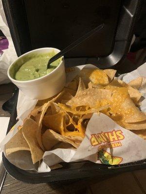 Chips with Guacamole slop sauce only a few chips had any cheese on them, and the guacamole slop was tasteless.