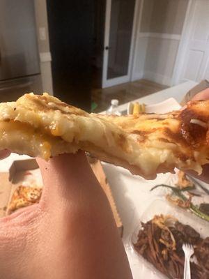 Sloppy cheesy pizza