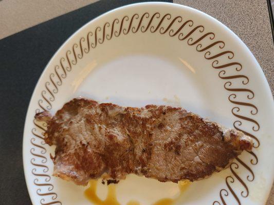 The steak from the Steak And Eggs breakfast.