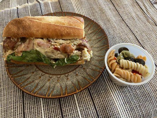 Chicken Bacon Ranch sub with side pasta salad.