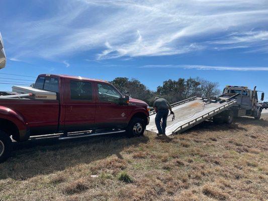 Truck being towed.