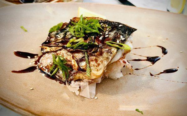 wood-fired spanish mackerel, black soy glaze, grated daikon, bonito flake, toasted sesame, scallion, lemon