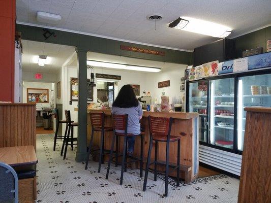 Sit at the counter or slide into a booth.