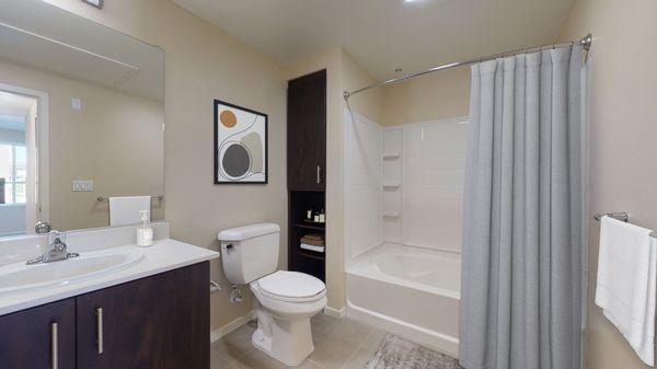 Staged bathroom with modern features.