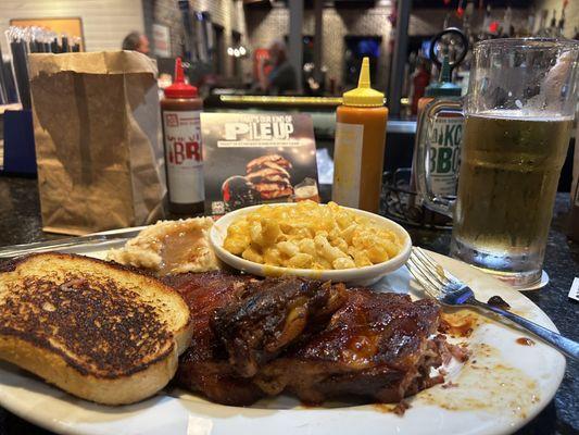 Full rack of Saint Louis ribs with Texas Toast and 2 sides -- Mac n cheese & mashed potatoes with gravy