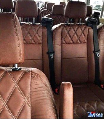 15 passenger van was completely reupholstered in brown leather!