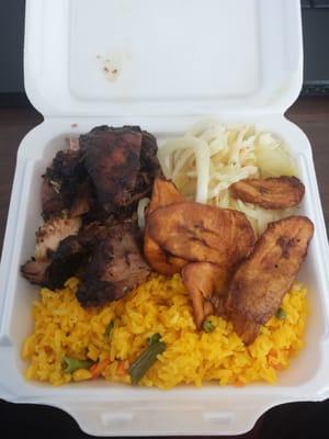 Jerk chicken w/ yellow rice, cabbage, and plantains. So awesome.