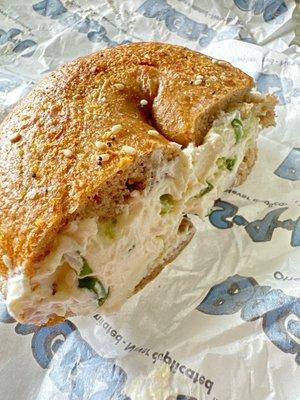 This is a whole wheat "everything" bagel with scallion cream cheese.