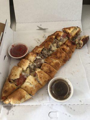 Beef roll with pepperoni and pineapple