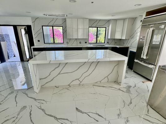 Kitchen cabinets, counter tops, tiles. Counter top fabricated by our team. 

Design by Amee