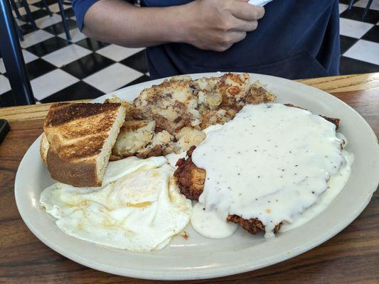 Chicken fried steak and eggs