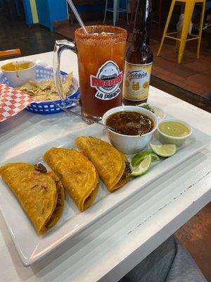 Queso tacos de birria de res