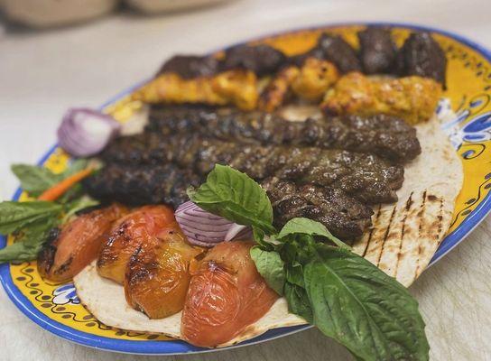 Mixed plate of chicken ground beef and steak