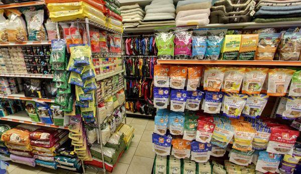 WIDE variety of organic and natural pet treats!  Also stacks and stacks of pet beds (top shelf).