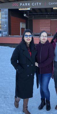 Business owner, Eyebrow Designer. Sabina(black coat) and Kapila (maroon sweater).