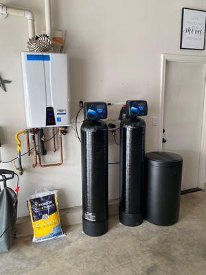 A Navien tankless water heater and softener system we installed for a happy homeowner.