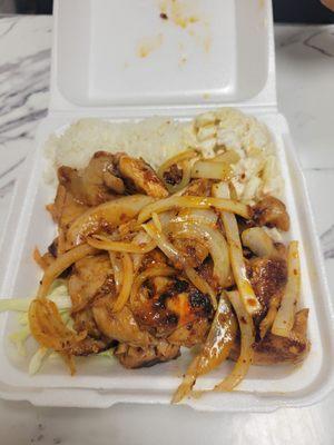 Spicy Chicken with grilled onions over rice