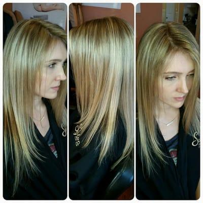 Beautiful subtle and bright highlights along with a haircut and style.