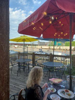 A really nice deck but it overlooks the parking lot and the highway.