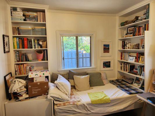 Daybed built-in with bookcase and cabinet