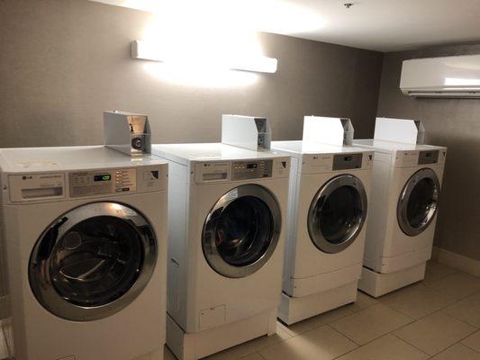 2 high-efficiency washers and 2 dryers. $1.00 per wash load (optional additional $0.25 to add super wash), $1.00 per dryer load.