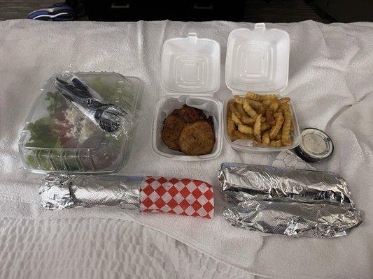 Large Greek Salad, fried FriedTomatoes, GYRO SANDWISH MEAL, chicken shawarma sandwich, extra pita and tzatziki.