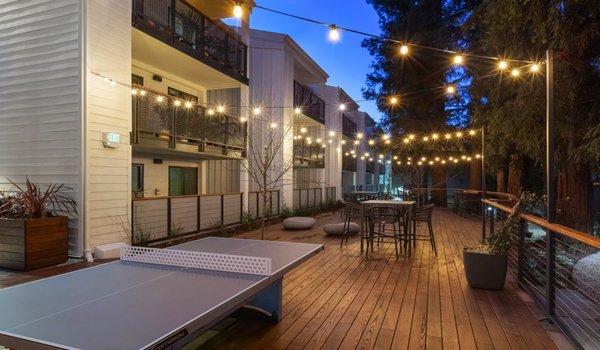 Enjoy your outdoor spaces and pick up a match of ping pong!