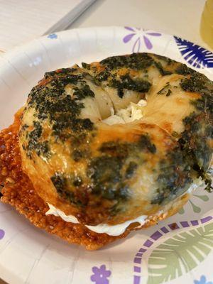 asiago & spinach bagel with an everything seasoning bottom