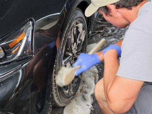 Scrubbin' off the stubborn brake dust!