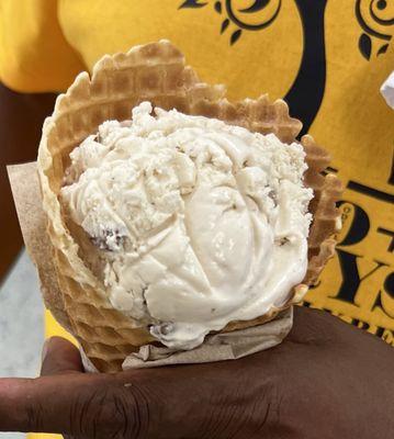 Butter pecan in a fresh hot waffle cone