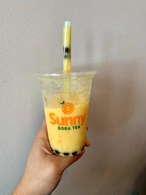 Mango smoothie with boba.