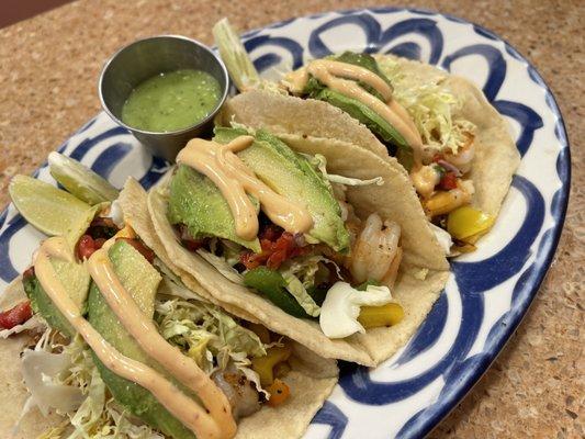 Shrimp Tacos served with rice & beans on the side