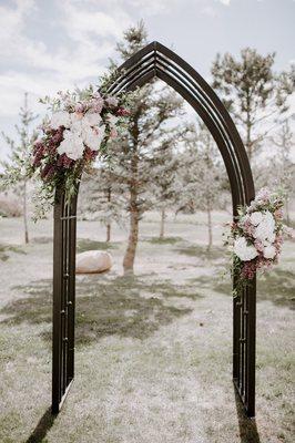 Wedding arch (we provided the arch, she provided the flowers)